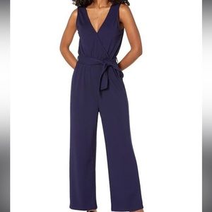 Michael Kors wide leg, wrap front jumpsuit with gold detail